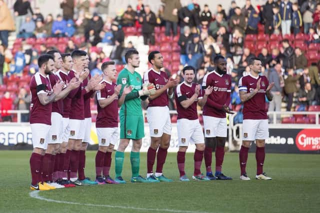 Cobblers pay tribute to Graham Taylor before kick-off. Picture: Kirsty Edmonds