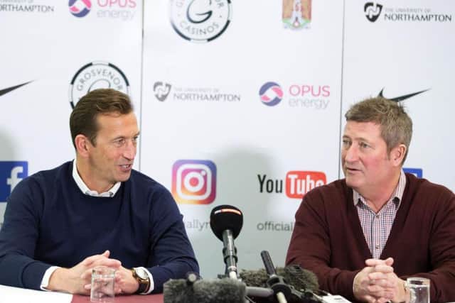 Cobblers boss Justin Edinburgh and assistant David Kerslake