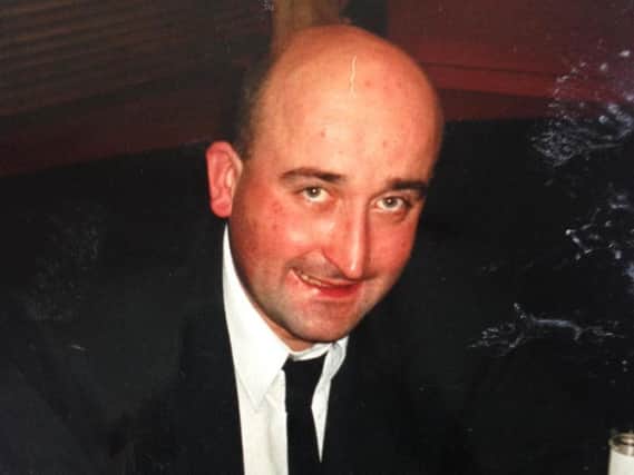 Jeremy Paradine has died at a block of flats near Glasgow. The Northampton man is believed to have been murdered.