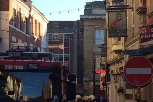 Fire crews are currently tackling flames at the Fox and Quill pub, which has entrances in St Giles Street and Fish Street.