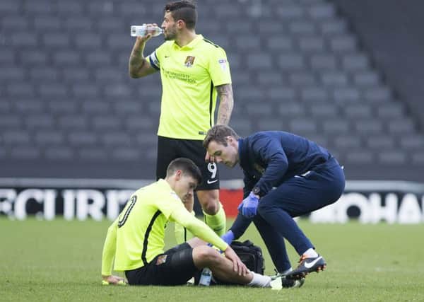 Alex Revell suffered a calf injury during Saturday's trip to Milton Keynes Dons (Picture: Kirsty Edmonds)