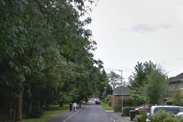 Police believe homes in Heather Lane may have CCTV footage of a violent robbery on Monday night.