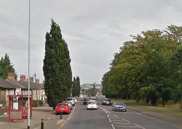 Part of the A508 London Road remains closed after a collision between a car and a bike.