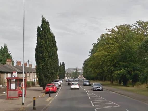 Part of the A508 London Road remains closed after a collision between a car and a bike.