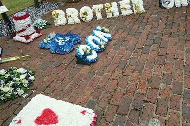 Floral tributes at Alex's funeral. His stepfather said: "He sometimes said he had no friends. But 200 people were there at his funeral. He was liked by so many."