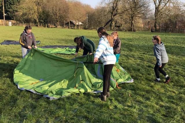 Scouts pitch their tents at the annual Brass Monkey Camp