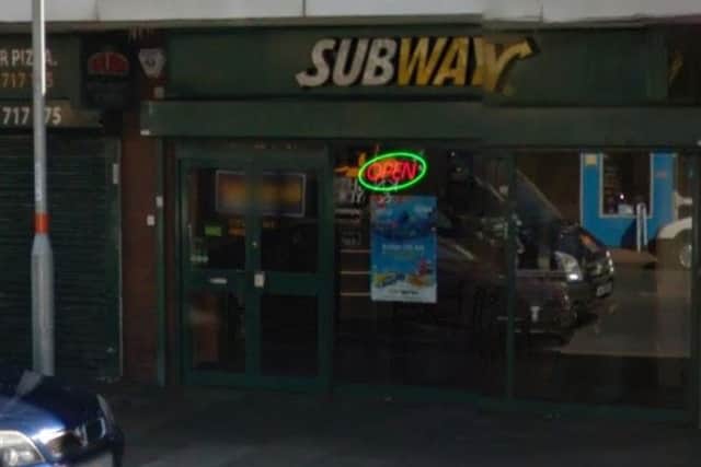 Two men entered the restaurant armed with a large knife.