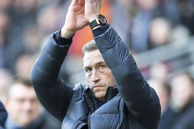 Justin Edinburgh was delighted with the backing he and his team got from the Cobblers supporters against Milton Keynes Dons
