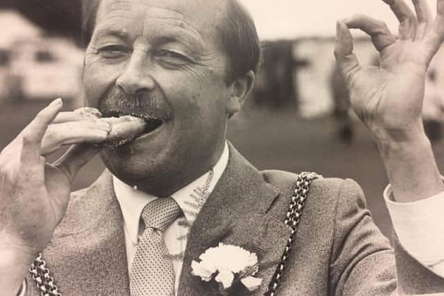 Mayor Bailey samples the fare at the 62nd Northampton Show. He attended 542 engagements in his year as mayor, breaking the Northampton record in 1988. Friends say he "will be missed by all."