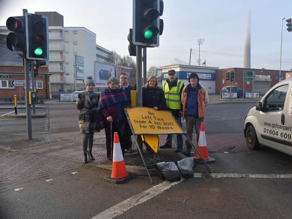 Residents in St James protested against a proposed closure of a left turn from Spencer Bridge Road to Weedon Road. Now a business owner says the roadworks are hampering trade.