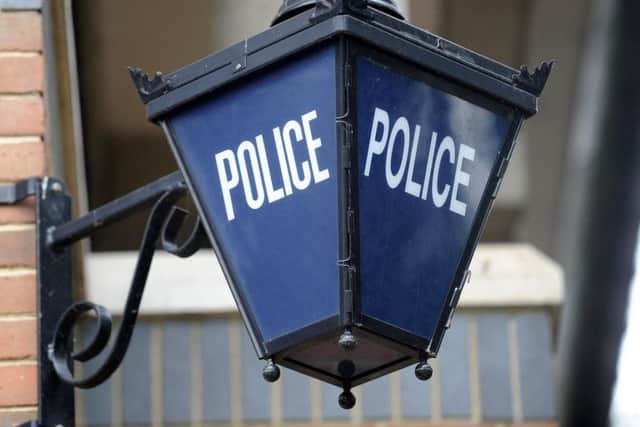 Police are trying to trace the owners of a set of family photographs dumped in Brackmills.