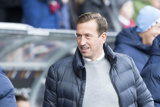ALL SMILES: Justin Edinburgh got his first win as Cobblers boss on Saturday. Pictures by Kirsty Edmonds
