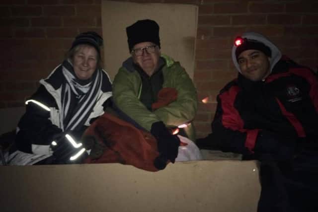 Northampton Borough Councillors Mary Markham, Stephen Hibbert and James Hill get comfy for the night.