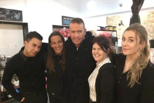 Staff of the Park Cafe with Councillor Tony Ansell, middle, stayed up all night to cater to participants.