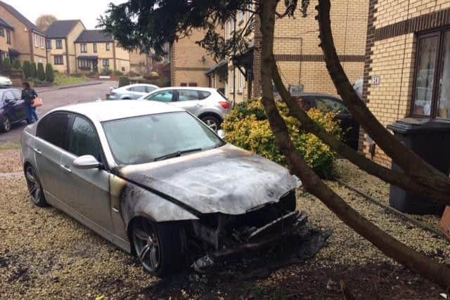 A neighbour had to wake up the house's occupants before tackling the fire himself with a fire extinguisher.