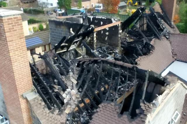 Dramatic aerial pictures show the majority roof of Corisande Collins' home has been destroyed by the blaze.