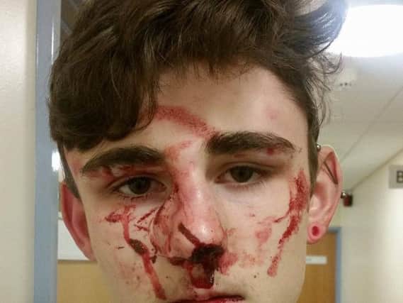 Two young thugs attacked a Northampton teenager while he was riding on his bike in Northampton