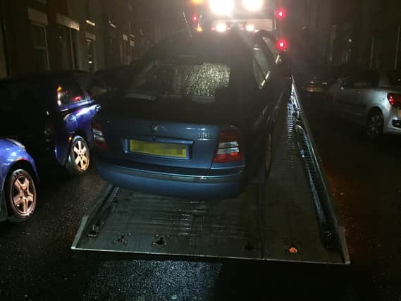 Police towed away a car and ticketed nuisance parkers in Northampton