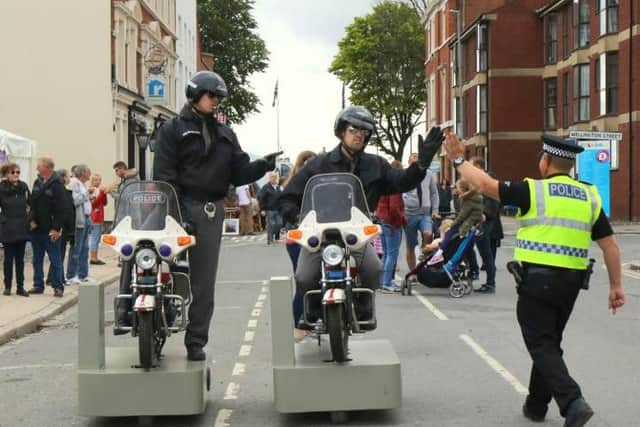 Police mime artists (Kiddy Ride Police patrol) meeting the real thing at Hull Freedome Festival 2016.