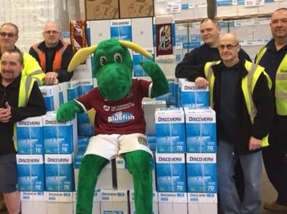 Staff at Bluefish Office Supplies in Northampton, which is now sponsoring Clarence the Dragon