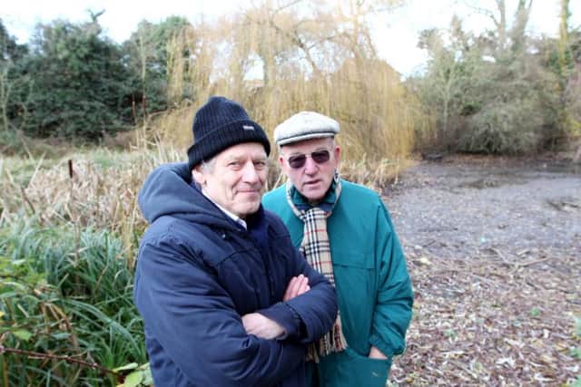 Dennis Nash, pictured right, received a Heart of the Community Award last year