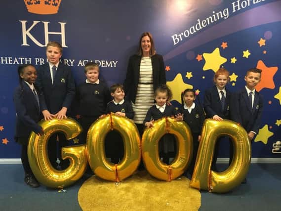 Pupils from King Heath Primary Academy celebrate their rating.