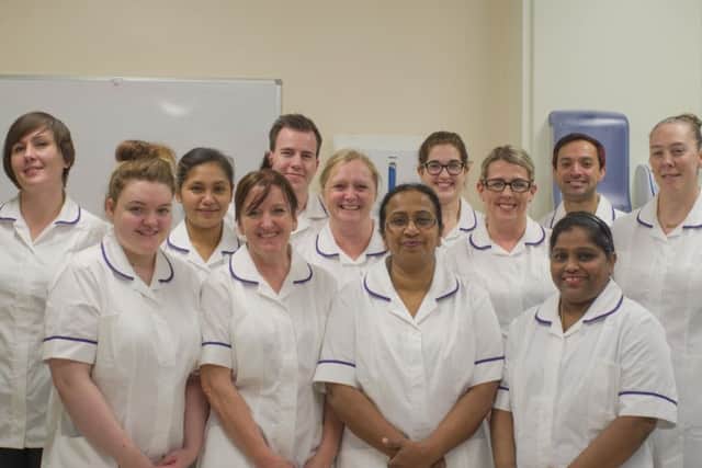 The nurse associates in their new uniforms
