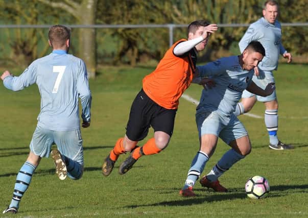 ACTION from Harpole's shock 6-0 home defeat at the hands of Kettering Nomads (Pictures: Dave Ikin)