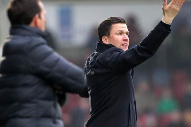 Chesterfield boss Gary Caldwell shows his frustration