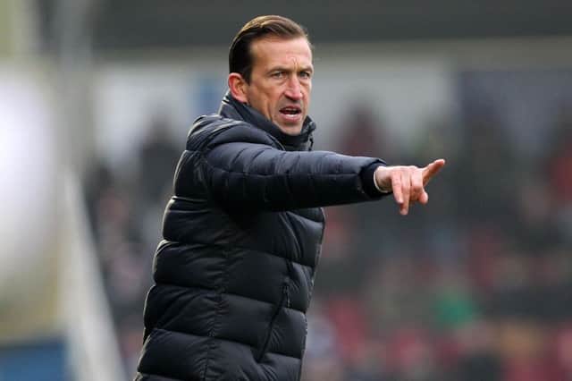 HUGE WIN: Justin Edinburgh issues the instructions during Saturday's win. Picture by Sharon Lucey