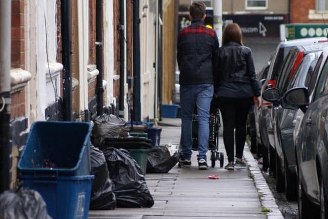 Uncollected rubbish in The Mounts. The council has been criticised for outsourcing environmental services to private companies.