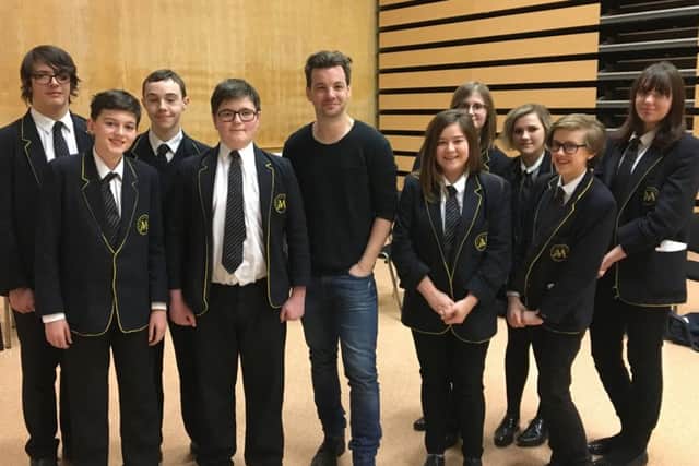 Game of Thrones star Gethin Anthony with students from the Malcom Arnold Academy