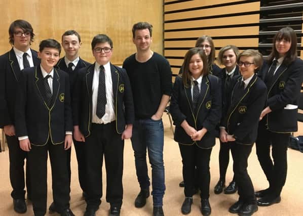 Game of Thrones star Gethin Anthony with students from the Malcom Arnold Academy