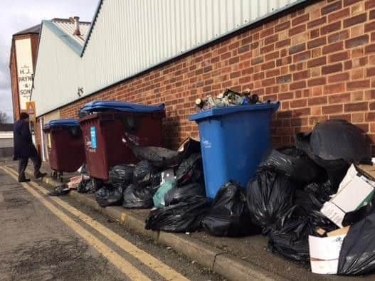The rubbish has made the pavement in Ash Street impassable.