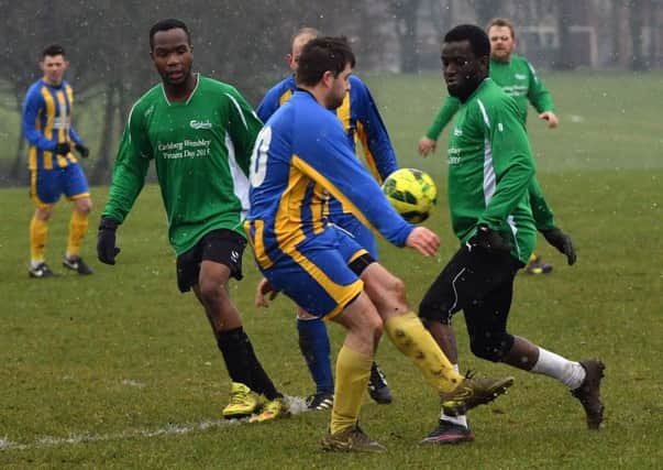 Action from Abington Stanley's clash with Spring Park (Pictures: Dave Ikin)