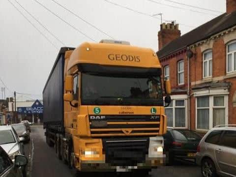 A lorry takes a short cut along the Scottish streets to avoid the Weedon Road works.