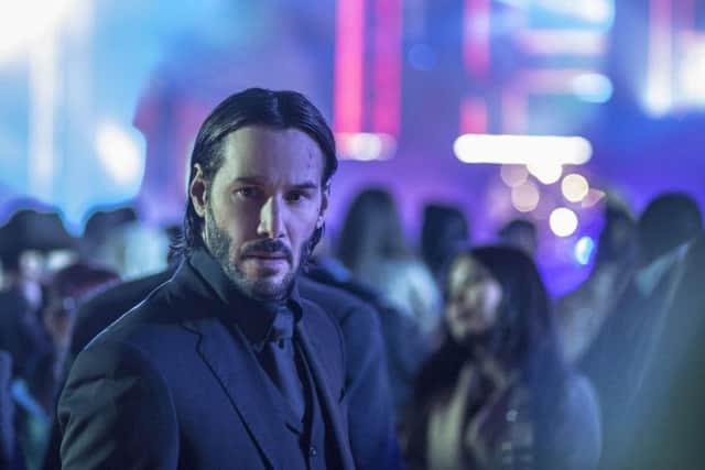 Keanu Reeves as John Wick