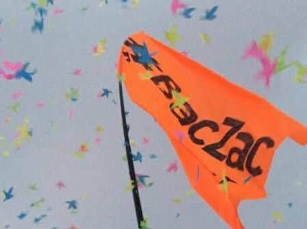 Zac's friends waved a flag at Glastonbury in his memory