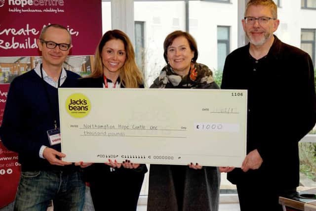 The team at Jack's Beans handed over a cheque to the Northampton Hope Centre yesterday