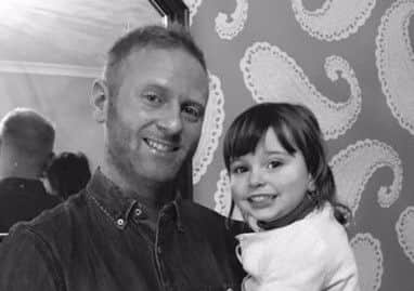 Daniel Darkes with his 4-year-old daughter Isla