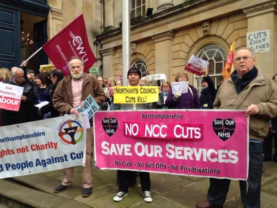 The 58 million worth of cuts has been approved despite two protests at County Hall.