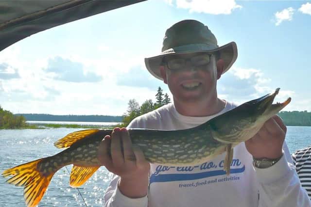 Fellow journalist Stuart Forster with his first ever pike.