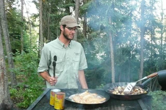 Fishing guide Dylan cooks up a tasty dinner.