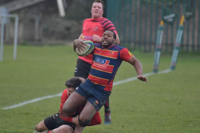 STOPPED IN HIS TRACKS - action from Old Northamptonians' defeat to Newbold (Pictures: Dave Ikin)