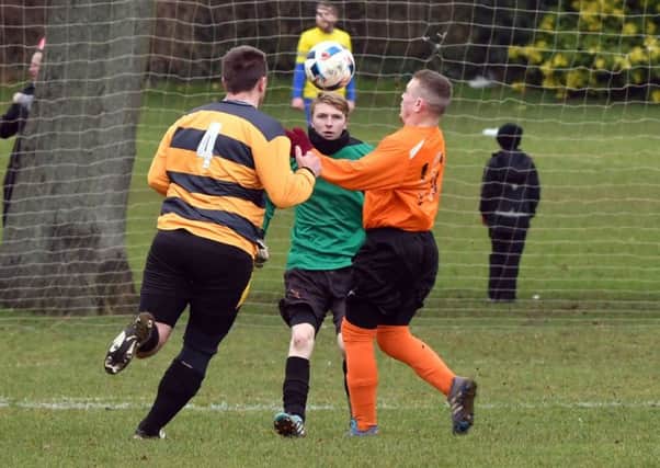 Action from West Haddon's 2-1 win over Real Roochers (Pictures: Dave Ikin)