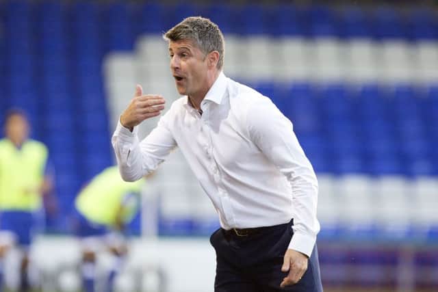 Oldham sacked Stephen Robinson a day before Justin Edinburgh was appointed Cobblers boss