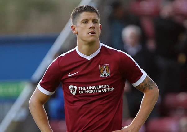 Cobblers striker Alex Revell will be out injured for a further three weeks