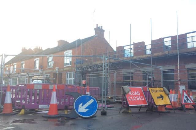 The road outside the building site on Adnitt Street has been closed off.