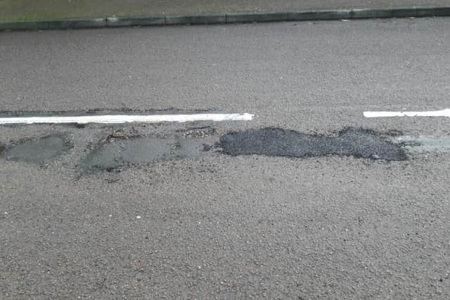 Temporary pothole repairs in Great Billing