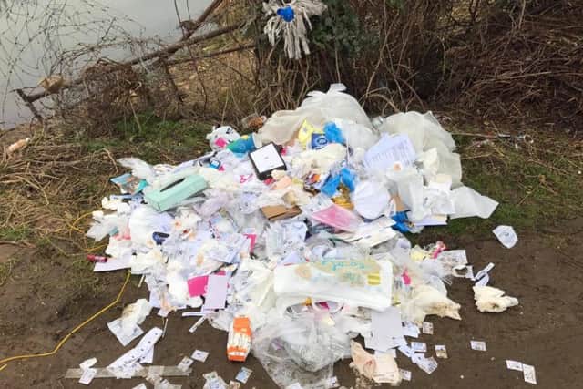 A heap of fly-tipped rubbish on Upton Mill Lane